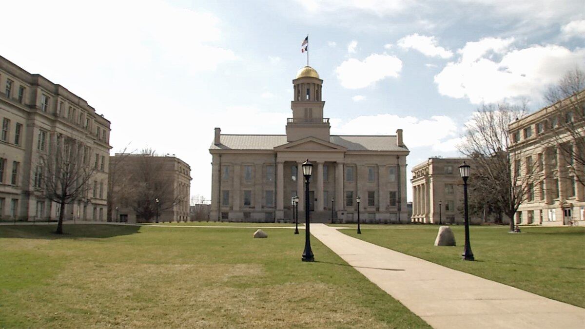 A normally-busy set of sidewalks on the Pentacrest on the University of Iowa campus in Iowa...