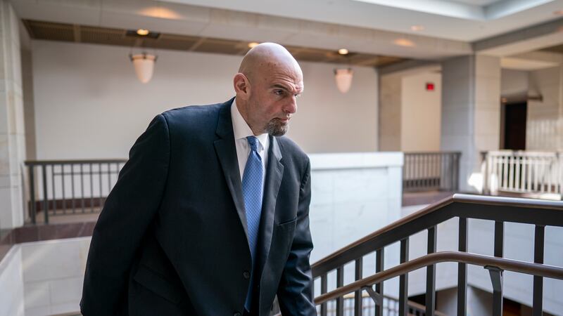 FILE - Sen. John Fetterman, D-Pa., leaves an intelligence briefing on the unknown aerial...