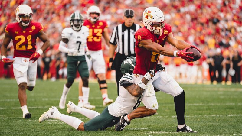 Xavier Hutchinson scores a touchdown for the Iowa State Cyclones on Saturday, Sept. 17, 2022.