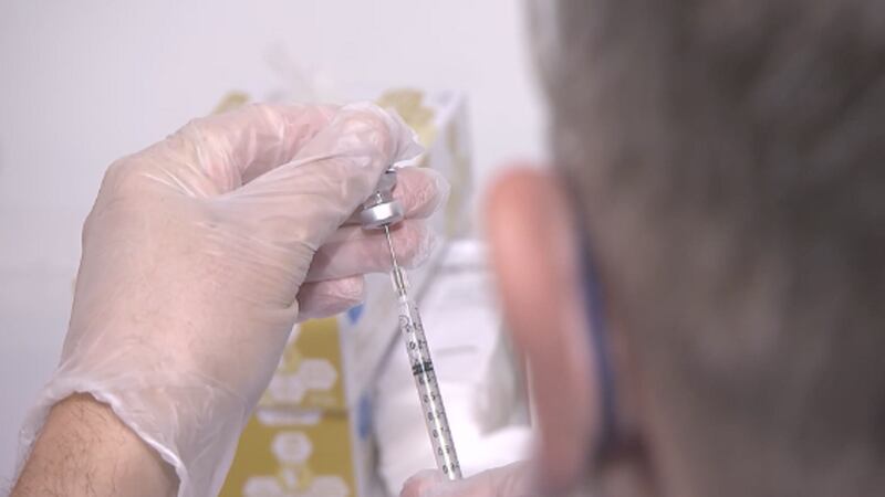 Doctor with a vaccine