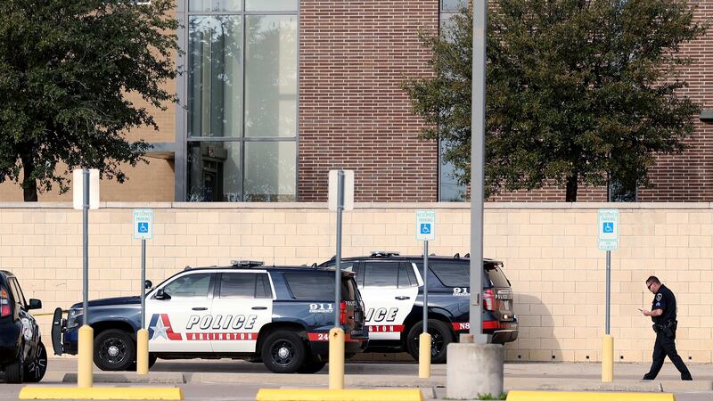 Arlington police investigate a shooting at Lamar High School in Arlington, Texas on Monday,...