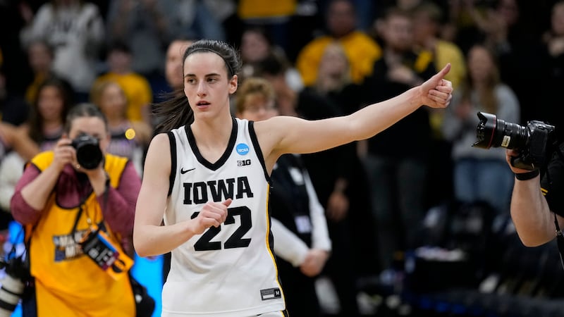 Iowa guard Caitlin Clark celebrates after a second-round college basketball game against...