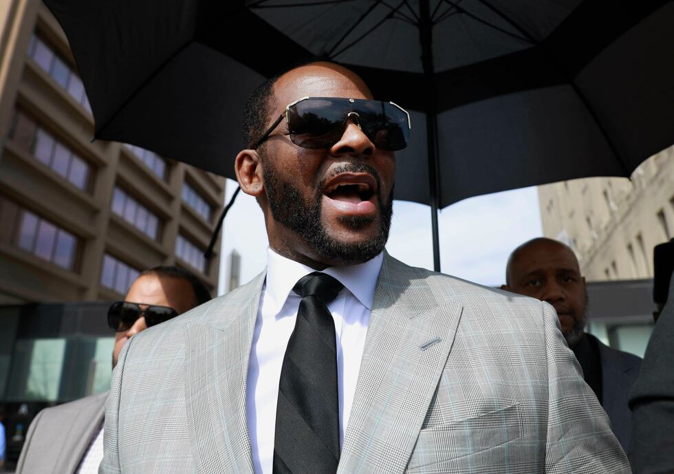 FILE - Musician R. Kelly leaves the Leighton Criminal Court building in Chicago on June 6,...