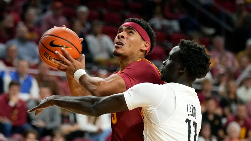 Iowa State guard Tamin Lipsey is fouled by Lindenwood guard Amoro Lado (11) during the second...