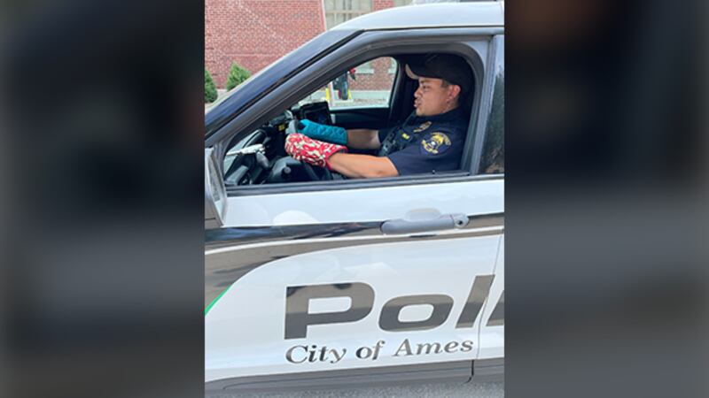 When it’s so hot it feels like an oven, why not dress the part? A police officer in Ames is...