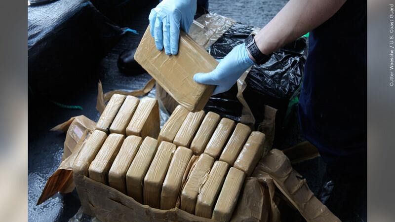 Packages of cocaine are seen.
